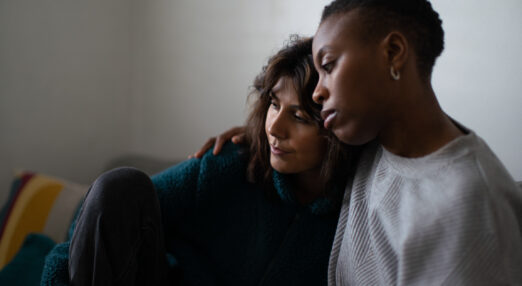 child hugging mother